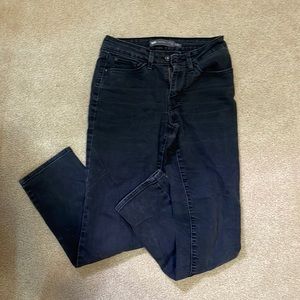 Black mid-rise, slim fit jeans